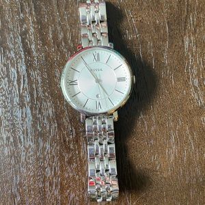Silver fossil watch